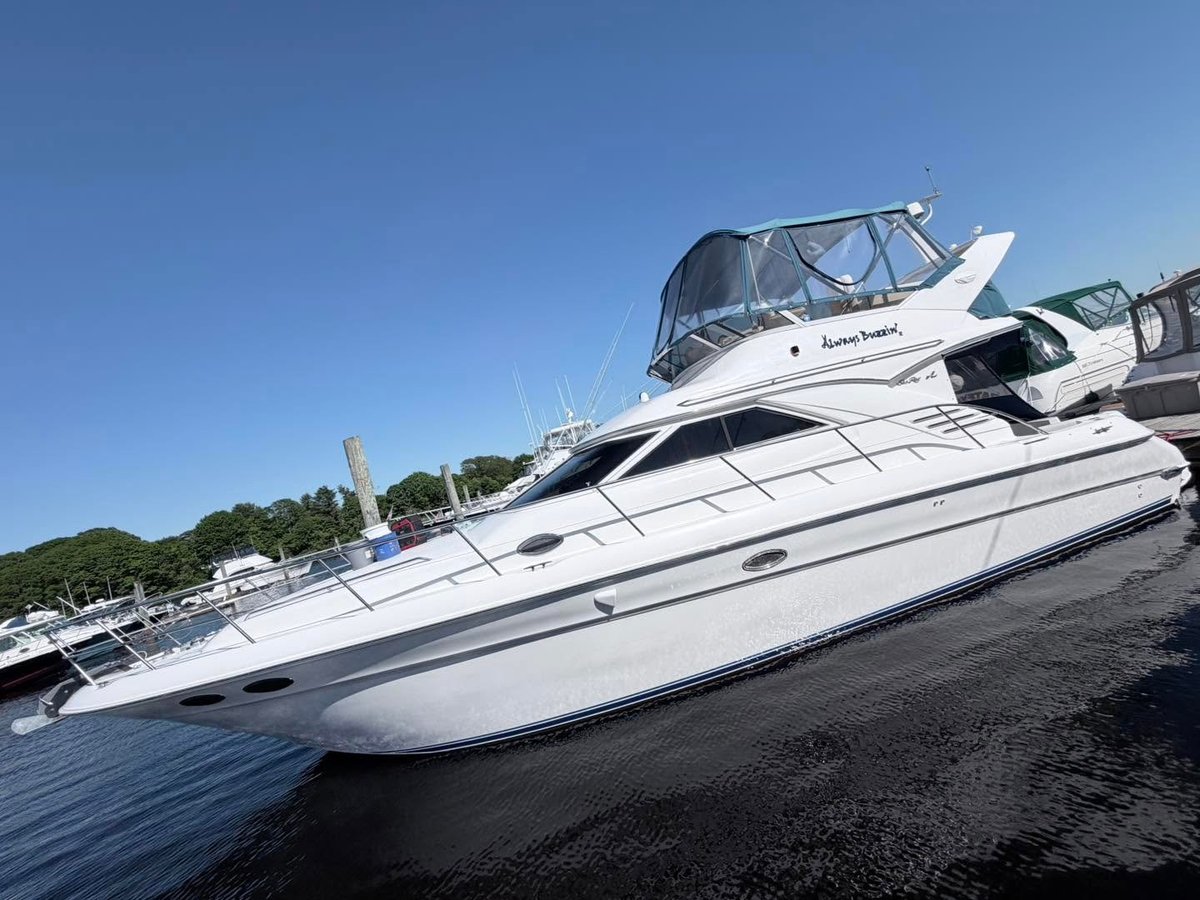 White and black luxury yacht at the marina